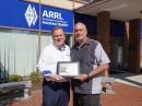 ARRL CEO David Minster, NA2AA (left) presents Ed Wilson, N2XDD (right), with the 2021 ARRL Technical Innovation Award on behalf of Wojciech Kaczmarski, SP5WWP.